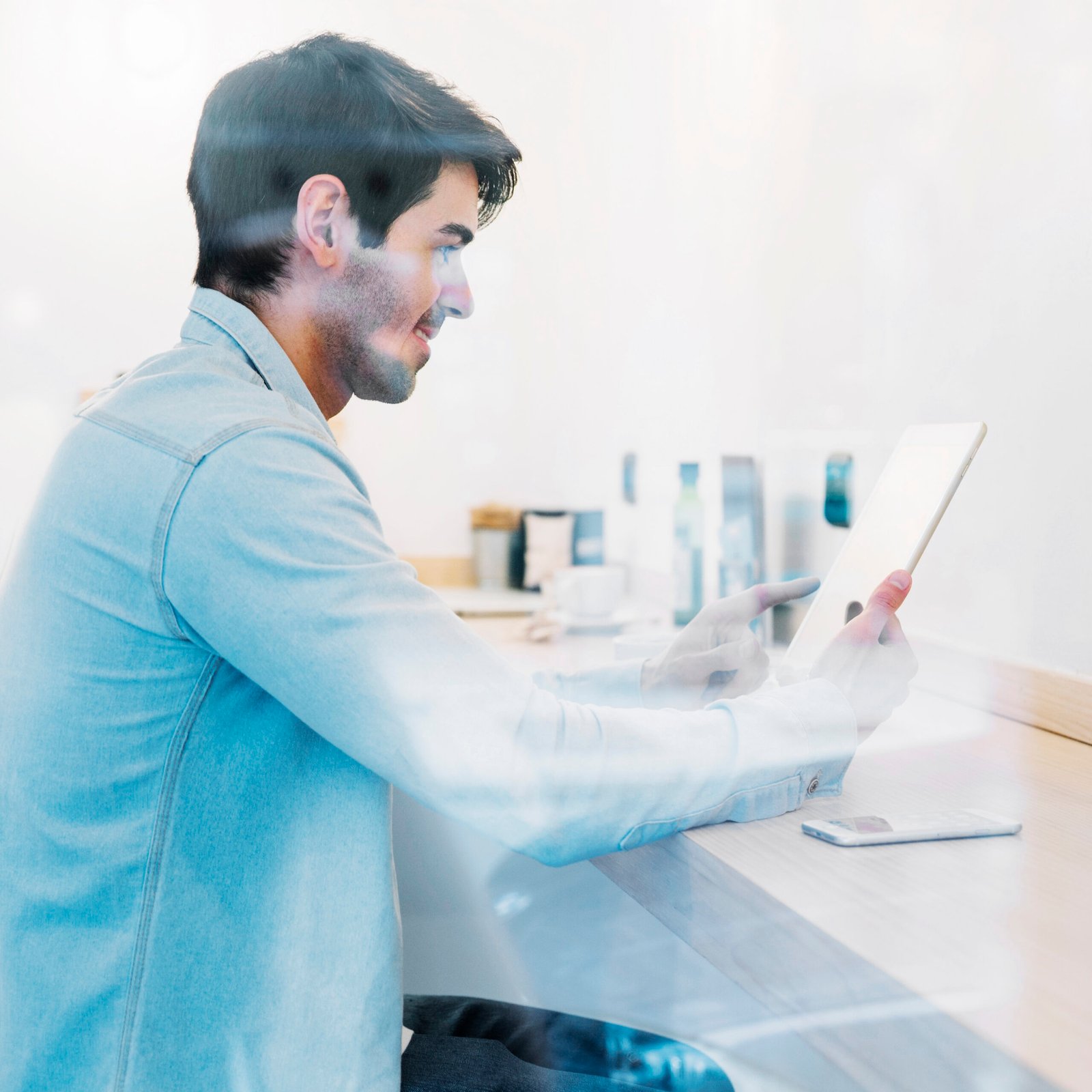 Engineer reviewing a candidate profile on a tablet